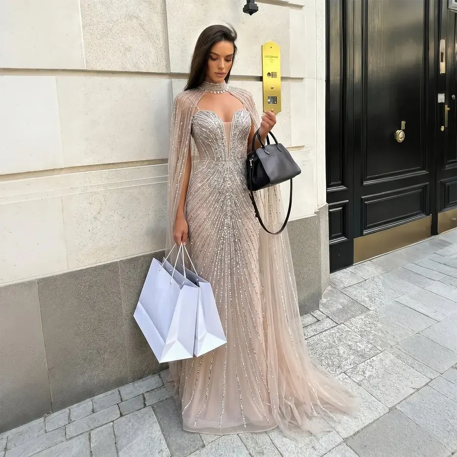 Woman wearing a beaded evening gown in the city